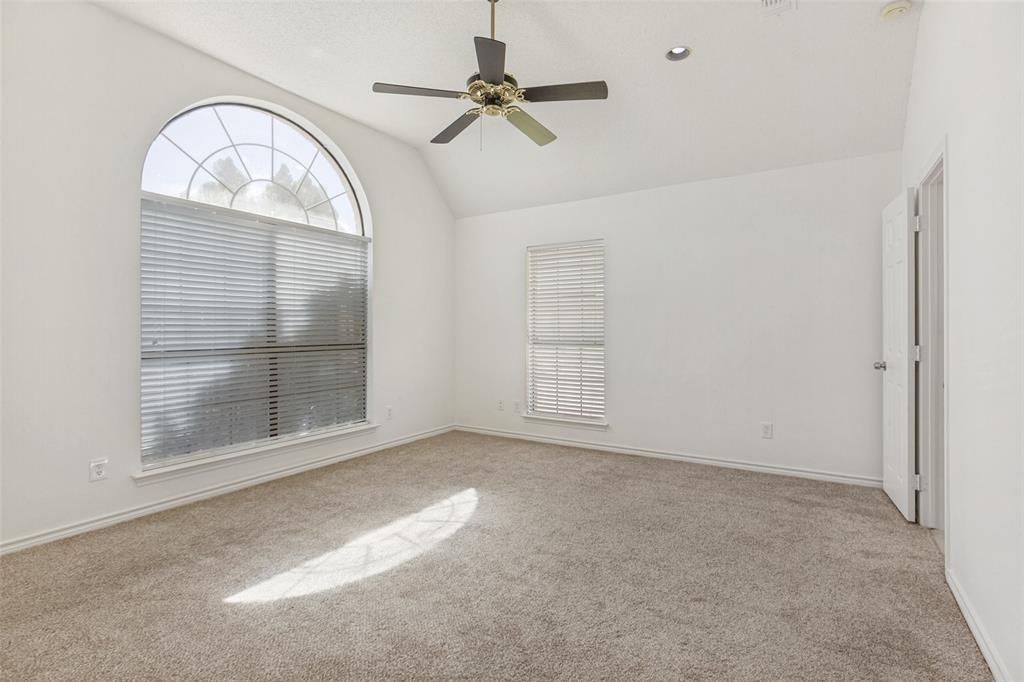 703 Rams Court Richardson, TX 75081 - Photo 7 of 15 Primary Bedroom w/Ensuite. Two closets.