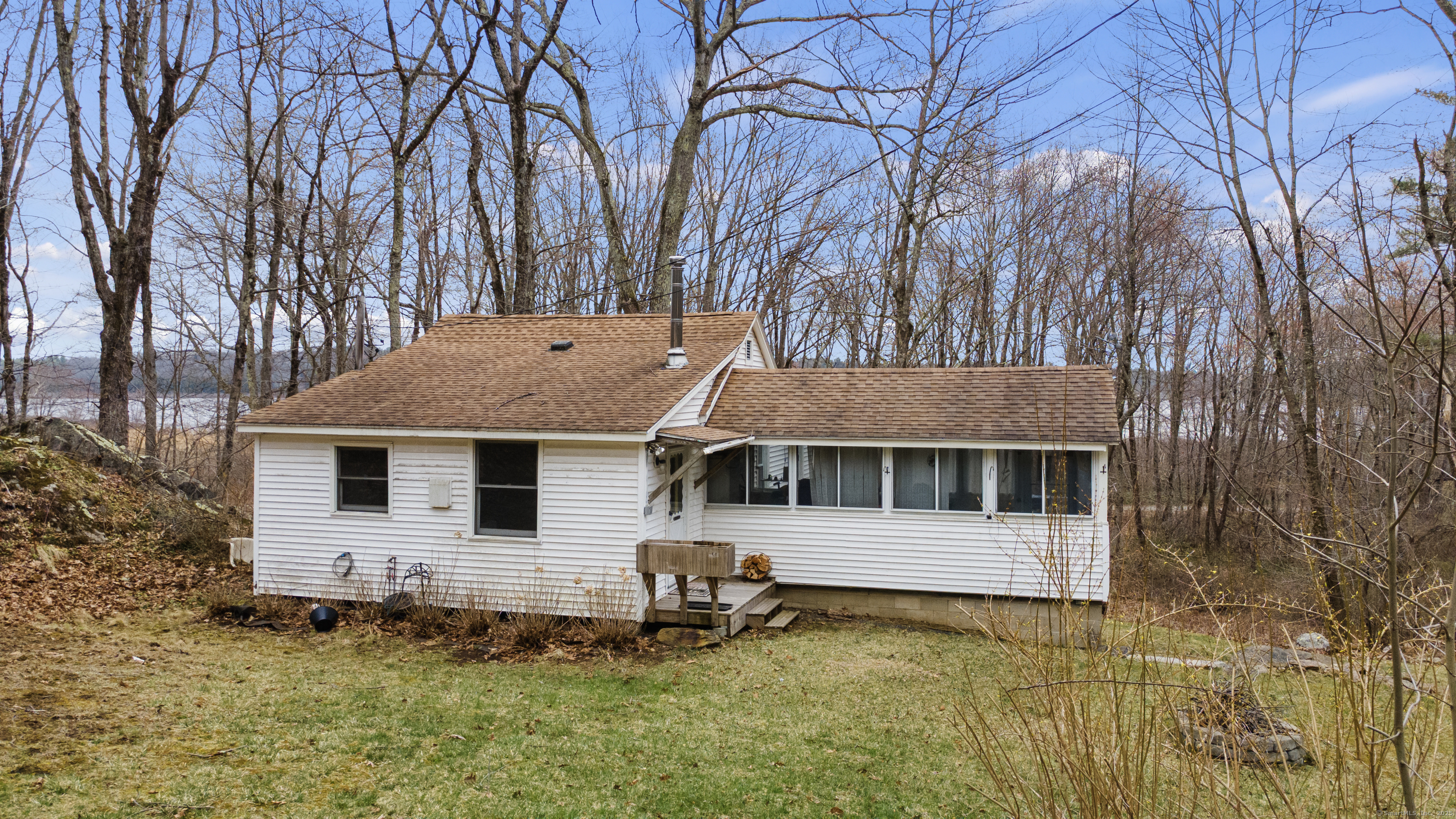 front view of a house with a yard