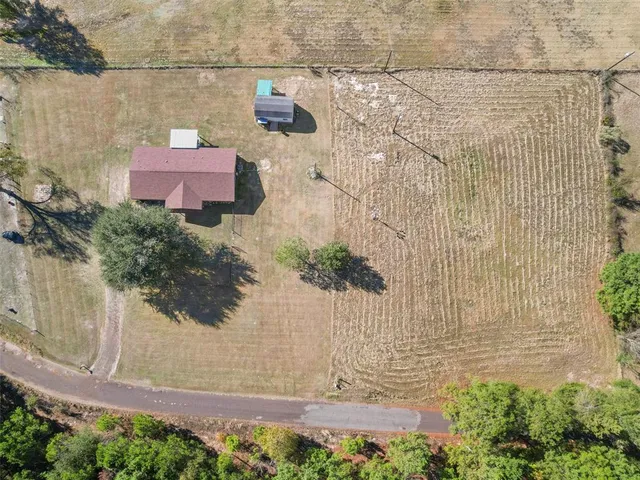 a view of a bench in front of house