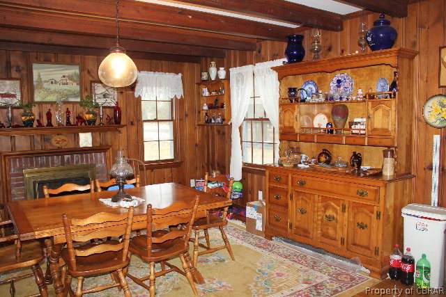 391 Haven Beach Road Moon, VA 23119 - Photo 8 of 43 a very nice looking dining room with a table and chairs