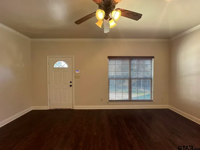 a view of kitchen with refrigerator microwave and wooden floor