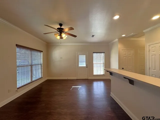 a kitchen with a sink stove and microwave