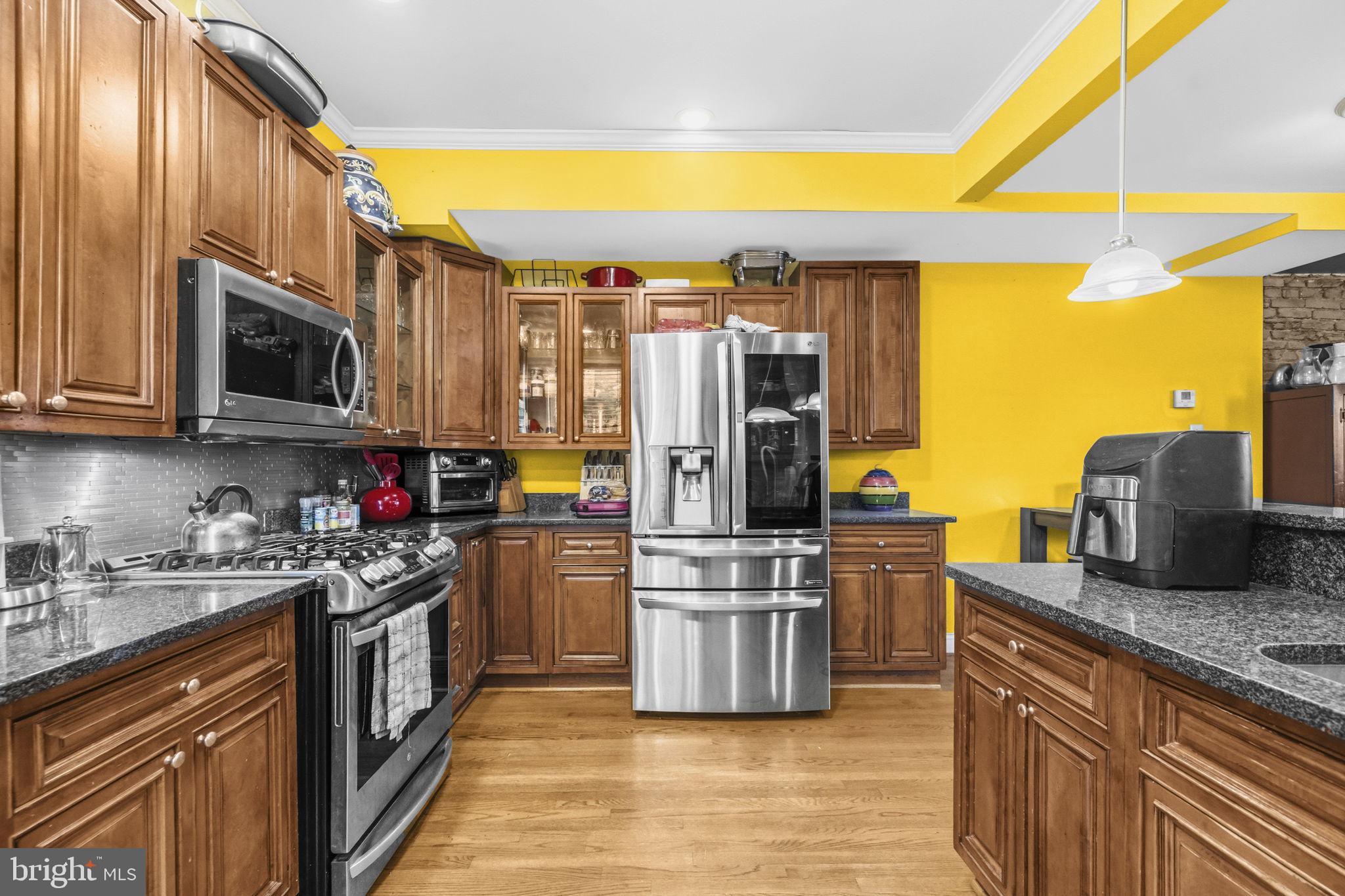 1824 3rd Street Northeast Washington, DC 20002 - Photo 8 of 30 Vibrant kitchen with modern flair.