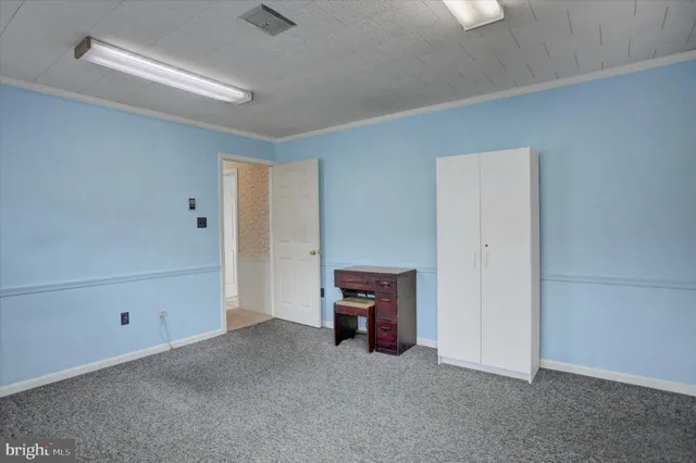 a bathroom with a tub and shower