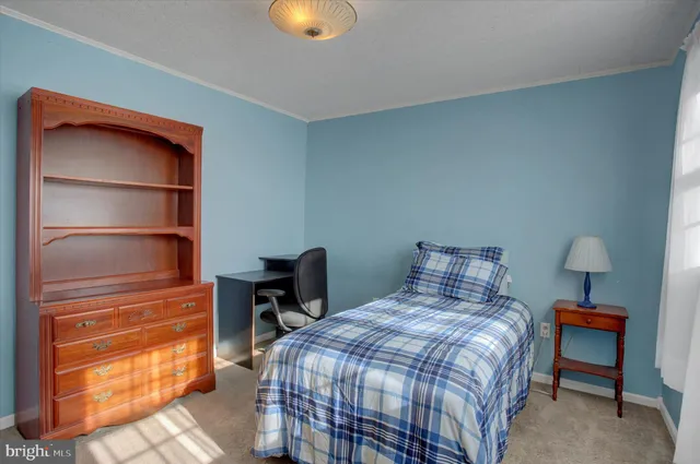 a view of a livingroom with a furniture