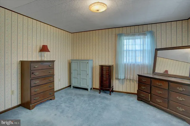 a view of a house with a big yard