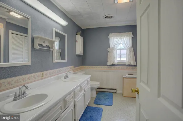 a front view of house with garden