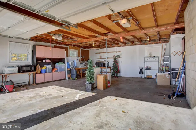 a view of a swimming pool and an outdoor seating