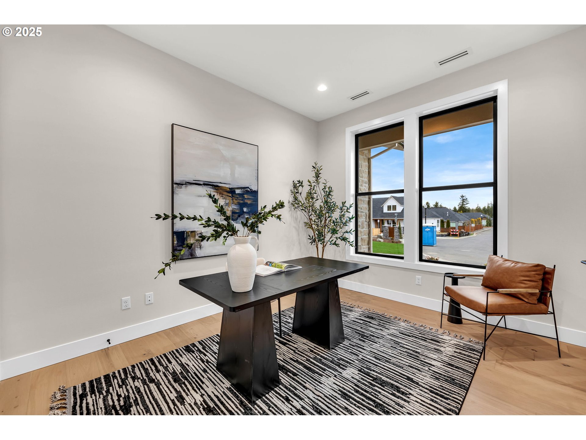 17716 Northeast 25th Avenue Ridgefield, WA 98642 - Photo 34 of 48 a living room with furniture and a window
