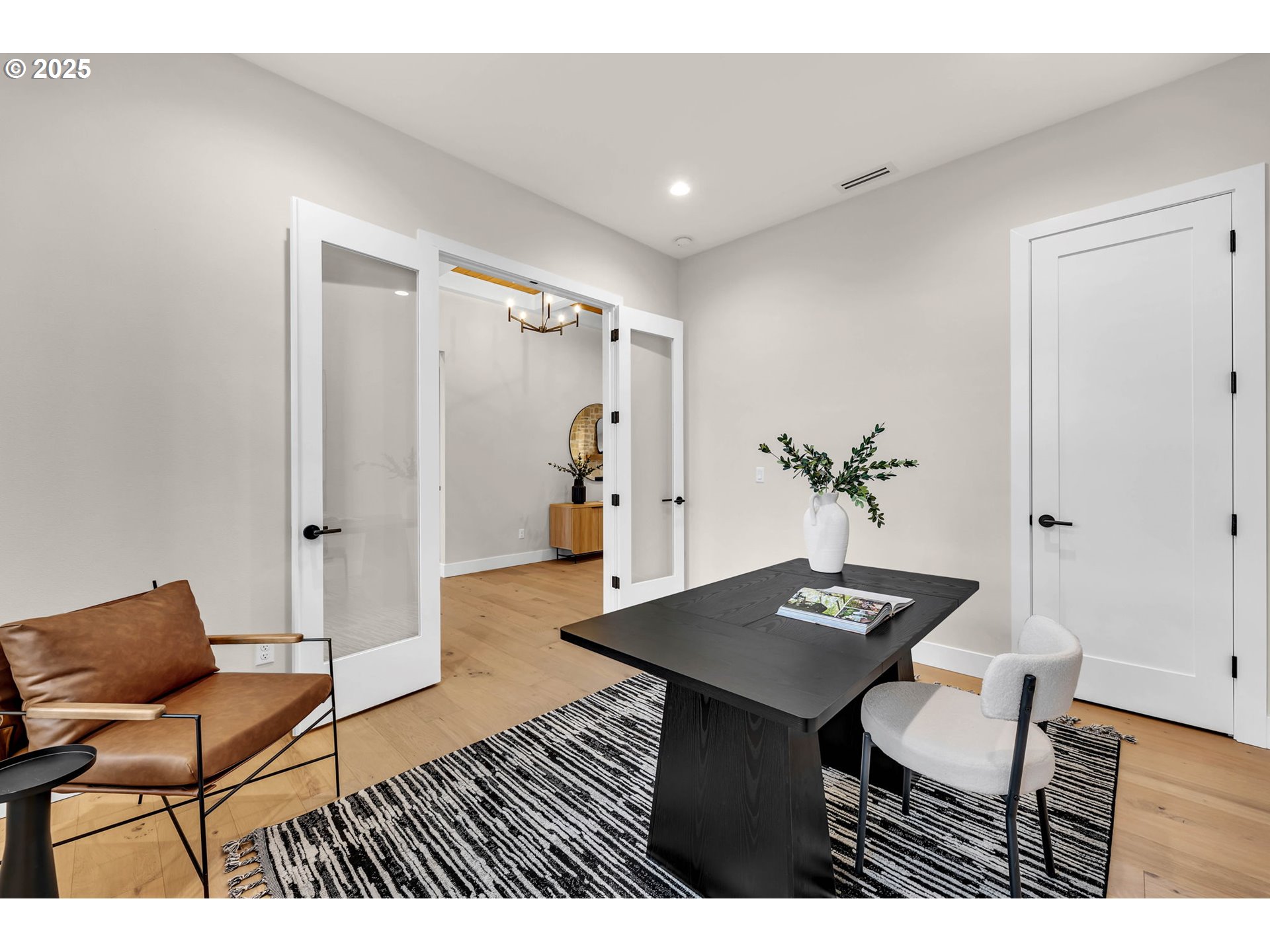 17716 Northeast 25th Avenue Ridgefield, WA 98642 - Photo 35 of 48 a view of a livingroom with furniture and hardwood floor
