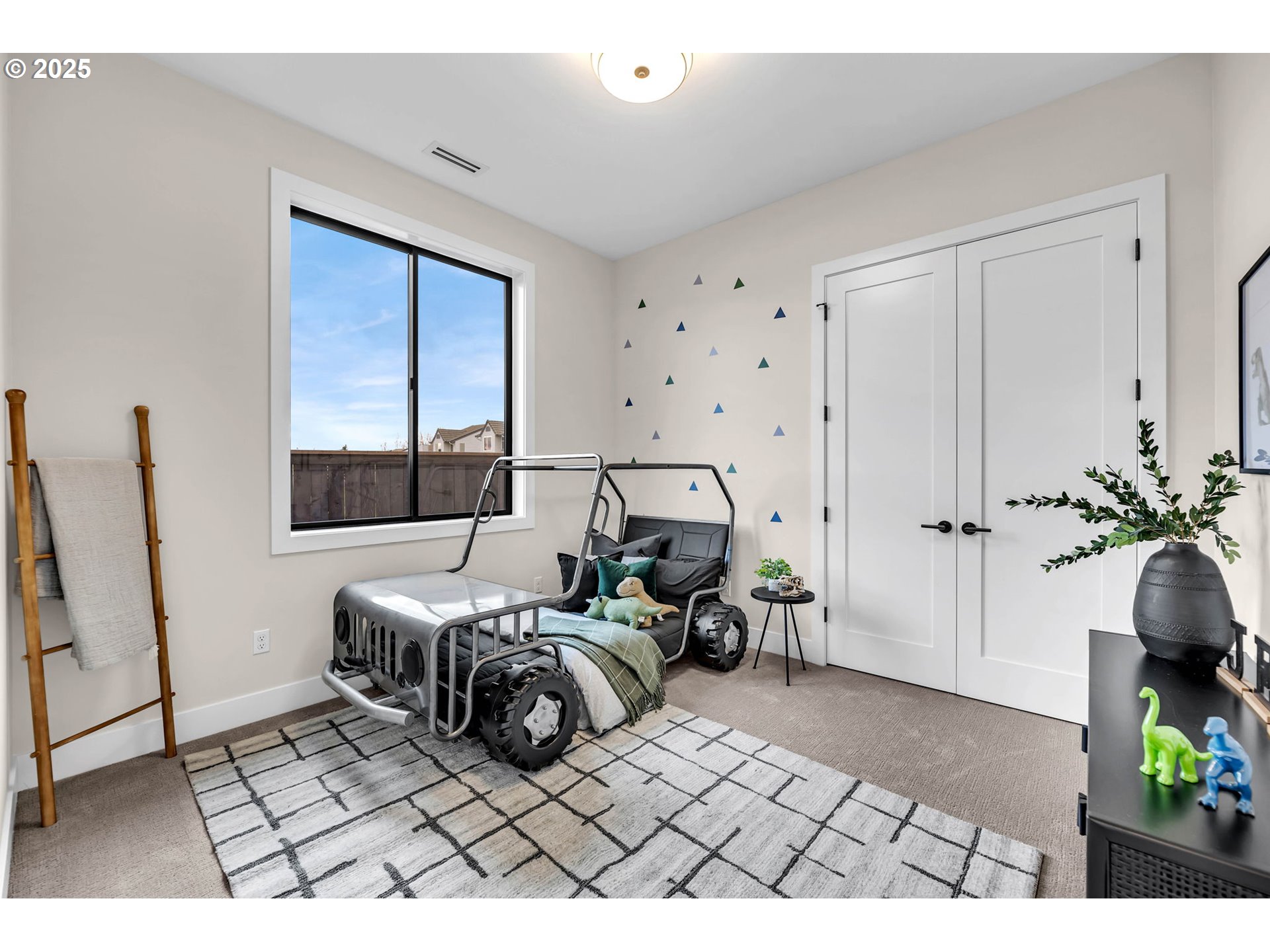 17716 Northeast 25th Avenue Ridgefield, WA 98642 - Photo 39 of 48 a bedroom with furniture and a window