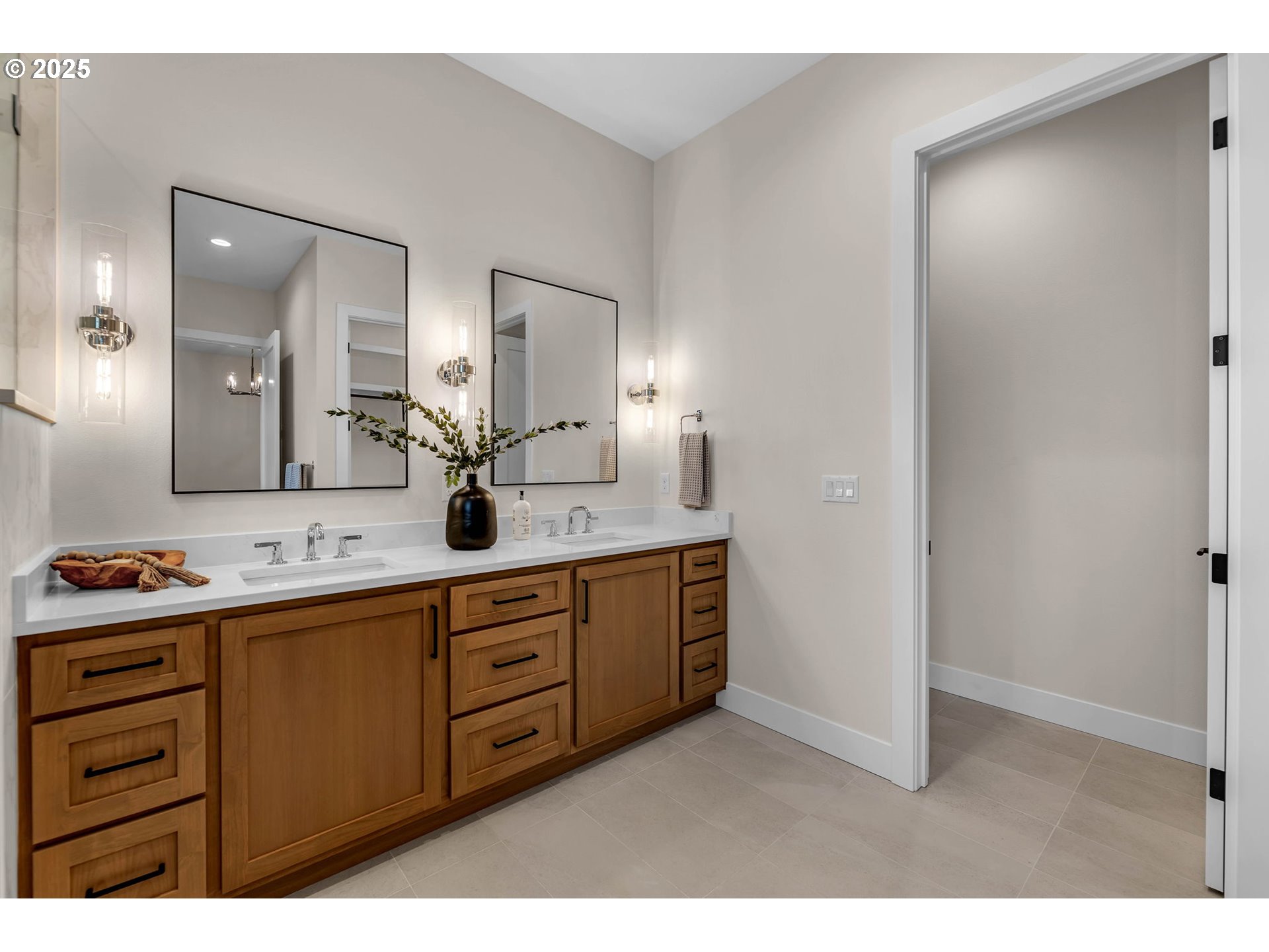 17716 Northeast 25th Avenue Ridgefield, WA 98642 - Photo 42 of 48 a bathroom with a double vanity sink and a mirror