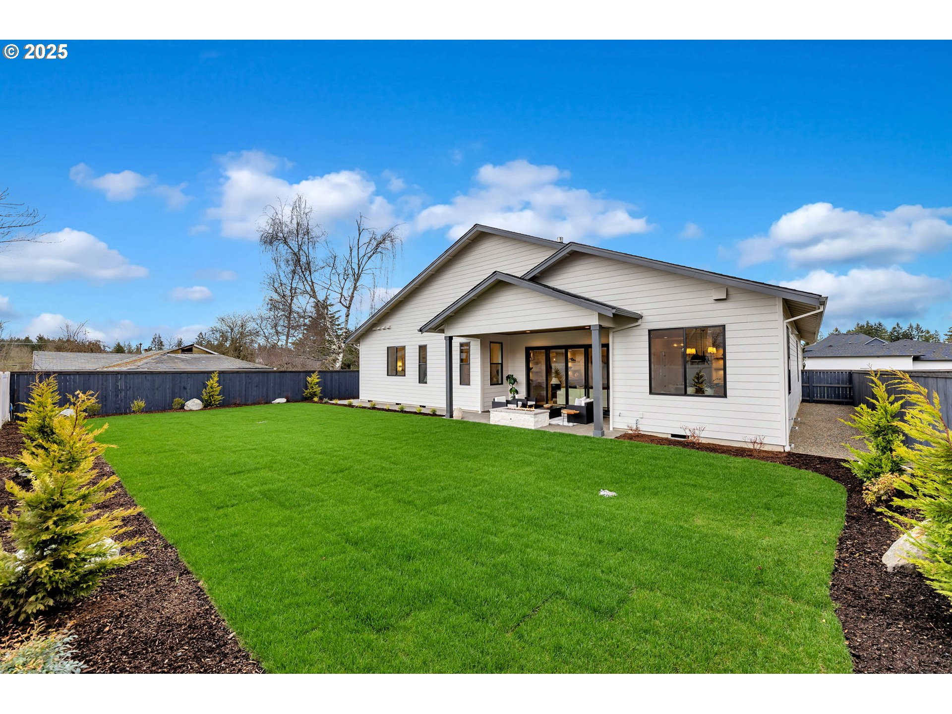 17716 Northeast 25th Avenue Ridgefield, WA 98642 - Photo 47 of 48 a view of a house with backyard and garden