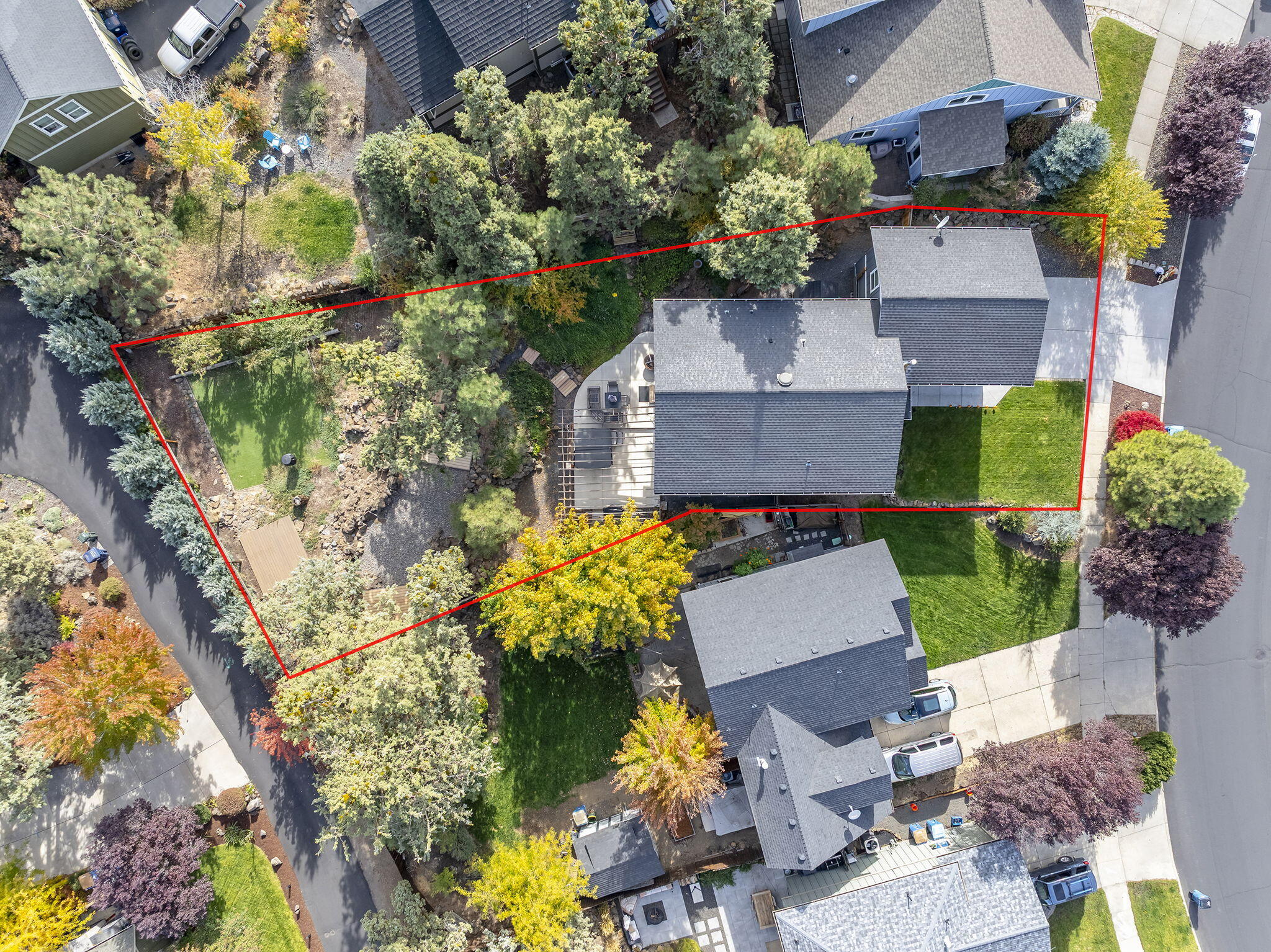 62906 Bilyeu Way Bend, OR 97701 - Photo 58 of 100 an aerial view of a house with a yard and a large tree