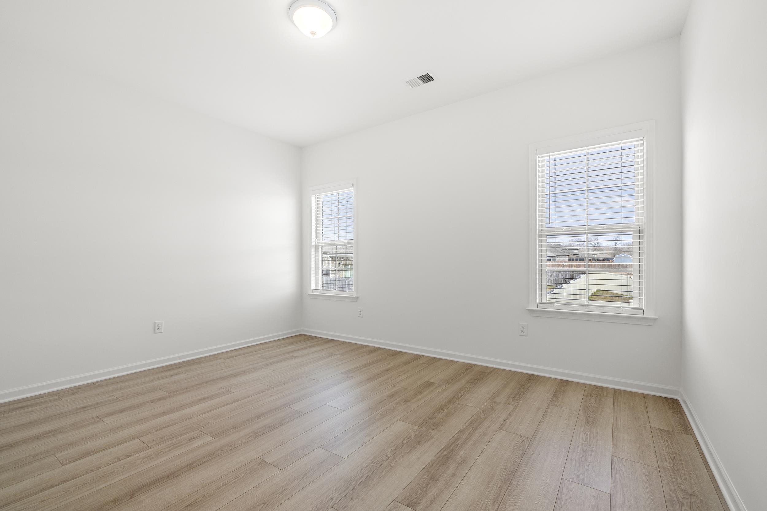 140 Oakland Rdg Cove Oakland, TN 38060 - Photo 22 of 30 Spare room featuring light wood-type flooring and baseboards