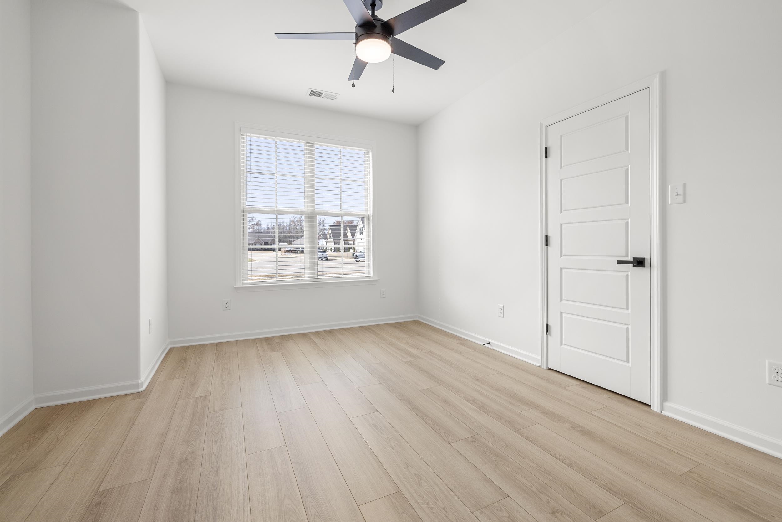 140 Oakland Rdg Cove Oakland, TN 38060 - Photo 26 of 30 Spare room featuring light wood-type flooring and ceiling fan