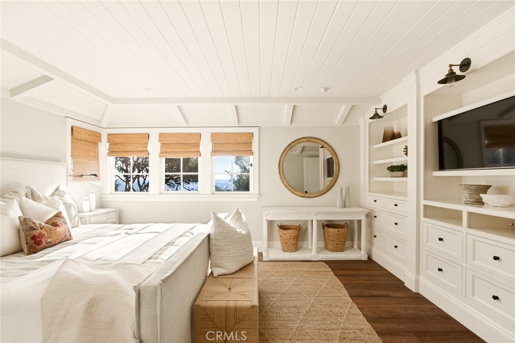 326 Ruby Street Laguna Beach, CA 92651 - Photo 27 of 71 a living room with furniture a flat screen tv and a fireplace