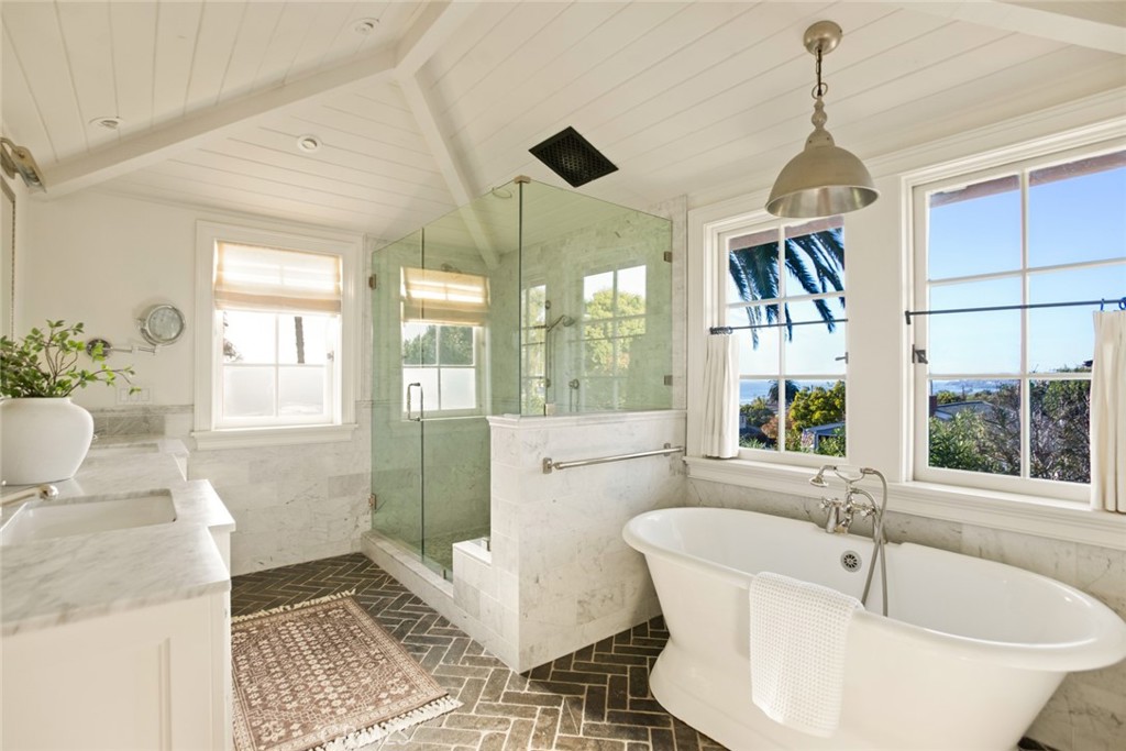326 Ruby Street Laguna Beach, CA 92651 - Photo 31 of 71 a spacious bathroom with a tub and window