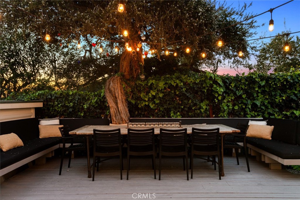 326 Ruby Street Laguna Beach, CA 92651 - Photo 70 of 71 a view of a tables and chairs in a patio