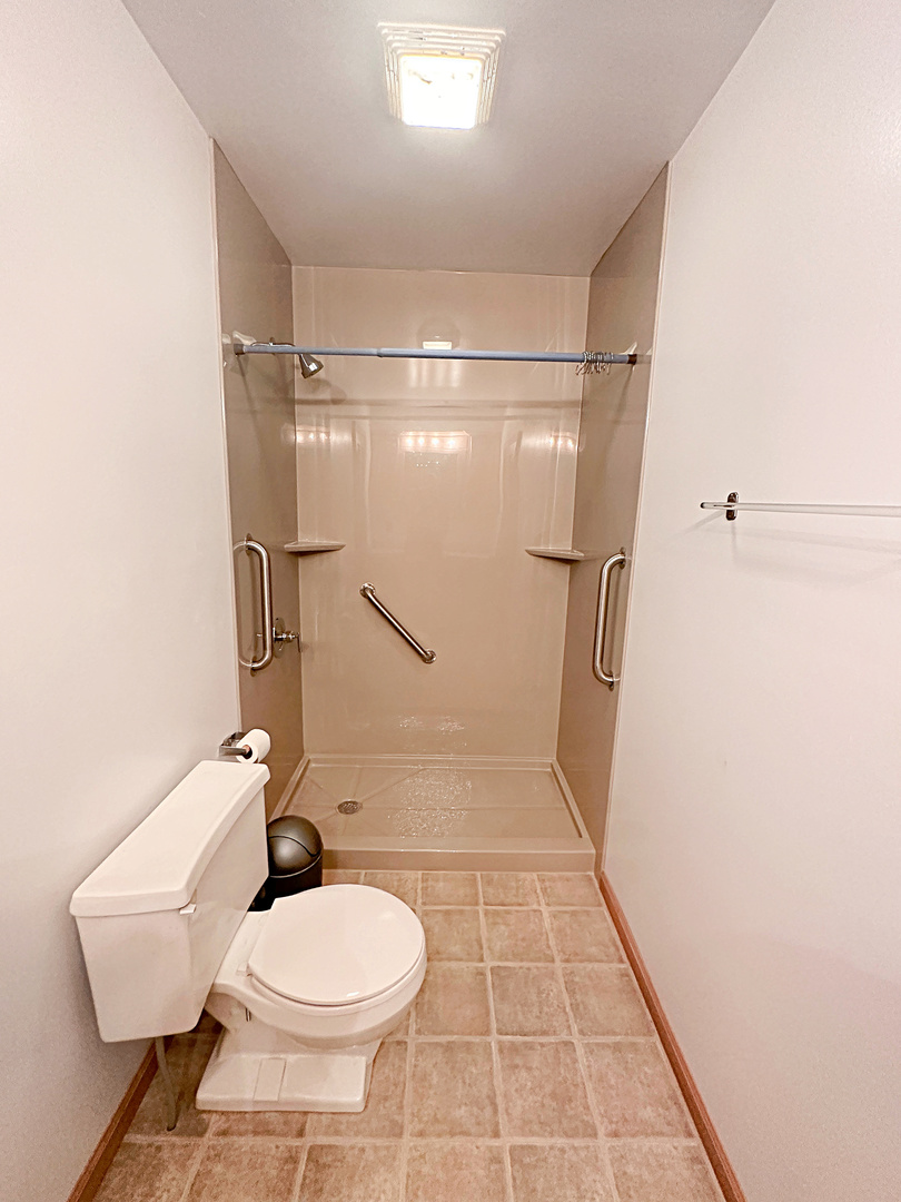 505 Morgan Street Long Point, IL 61333 - Photo 23 of 36 a bathroom with a toilet and a shower