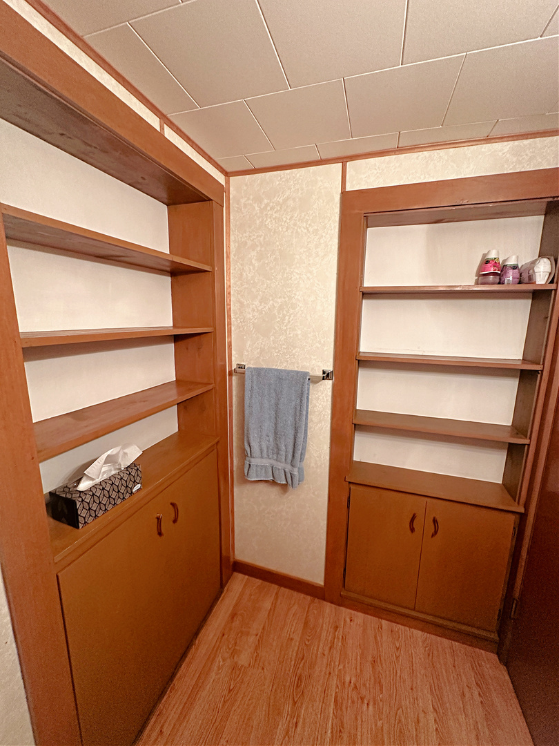 505 Morgan Street Long Point, IL 61333 - Photo 25 of 36 a view of walk in closet with empty racks