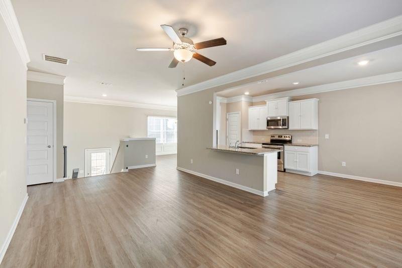 760 McCart Road Lawrenceville, GA 30045 - Photo 14 of 40 a view of kitchen with sink and wooden floor