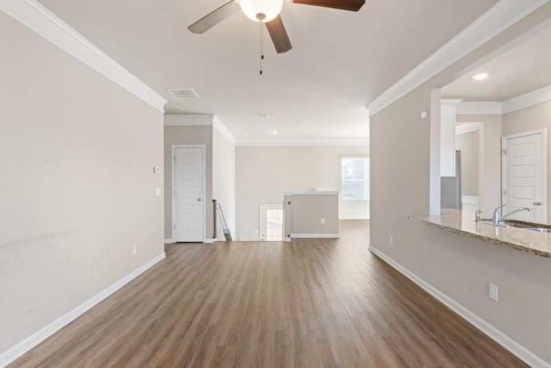 760 McCart Road Lawrenceville, GA 30045 - Photo 15 of 40 a view of a livingroom with wooden floor