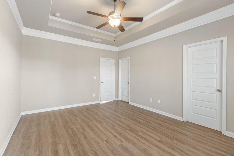 760 McCart Road Lawrenceville, GA 30045 - Photo 22 of 40 an empty room with closet and a ceiling fan