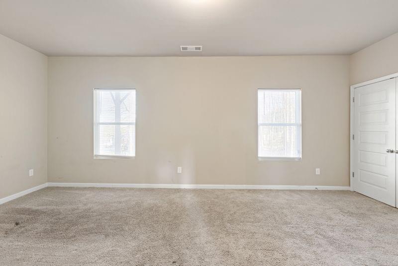 760 McCart Road Lawrenceville, GA 30045 - Photo 27 of 40 an empty room with windows