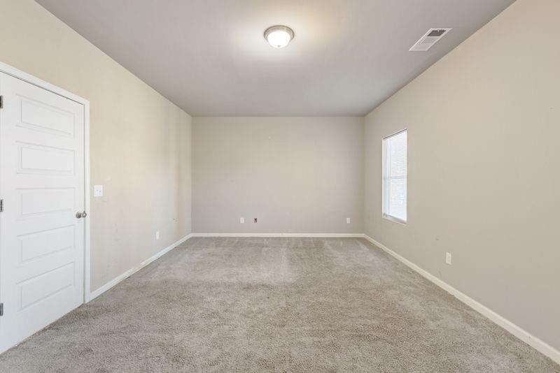 760 McCart Road Lawrenceville, GA 30045 - Photo 29 of 40 an empty room with windows