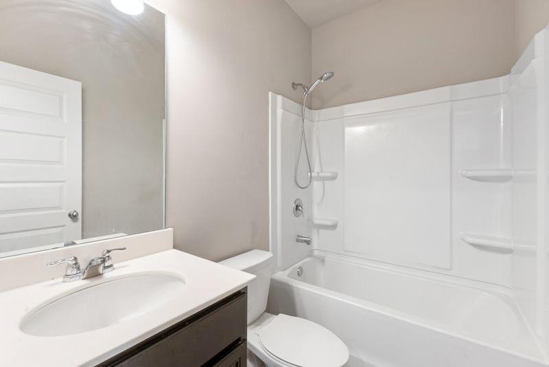 760 McCart Road Lawrenceville, GA 30045 - Photo 30 of 40 a bathroom with a sink toilet and bathtub