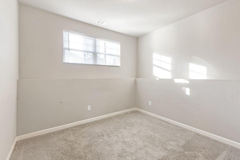 760 McCart Road Lawrenceville, GA 30045 - Photo 32 of 40 an empty room with windows
