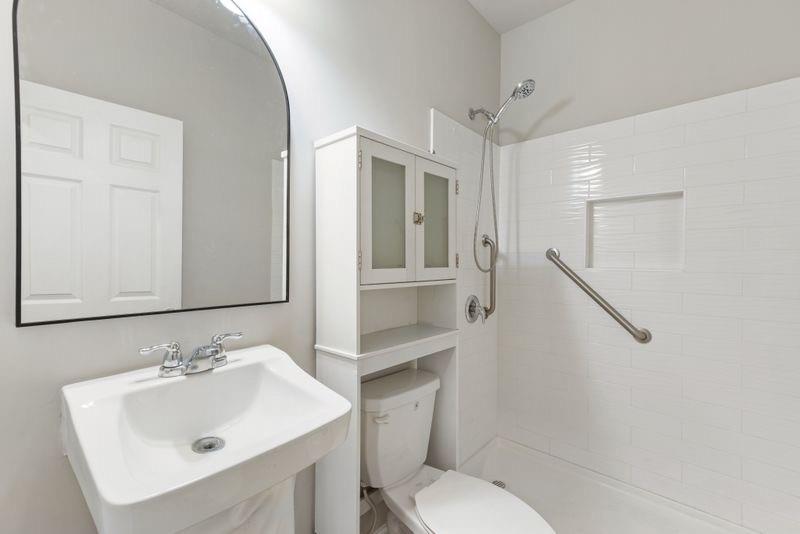 760 McCart Road Lawrenceville, GA 30045 - Photo 34 of 40 a bathroom with a sink toilet and vanity