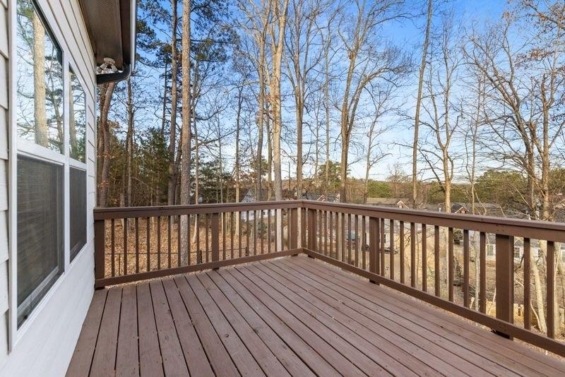 760 McCart Road Lawrenceville, GA 30045 - Photo 37 of 40 a view of deck with wooden floor and fence