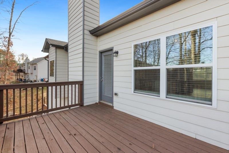 760 McCart Road Lawrenceville, GA 30045 - Photo 38 of 40 a view of a balcony with wooden floor