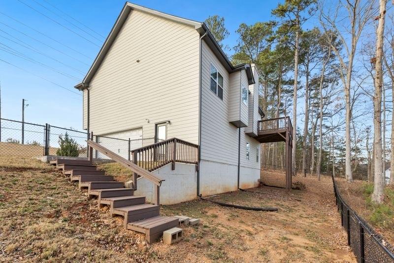 760 McCart Road Lawrenceville, GA 30045 - Photo 40 of 40 a view of a house with a yard