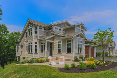 front view of a house with a yard