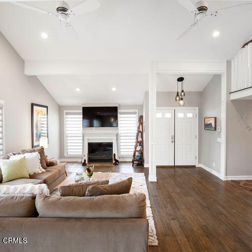3241 Harbor Boulevard Oxnard, CA 93035 - Photo 4 of 32 a living room with furniture flat screen tv and a fireplace