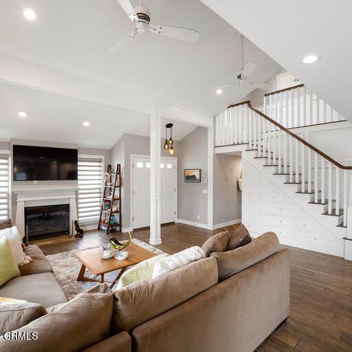 3241 Harbor Boulevard Oxnard, CA 93035 - Photo 6 of 32 a living room with furniture ceiling fan and a fireplace