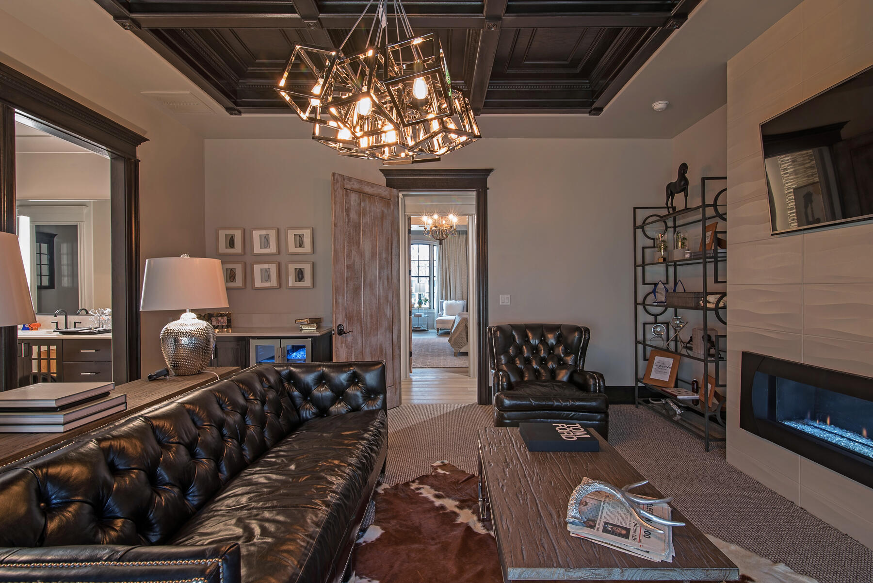 4008 139th Street Lubbock, TX 79423 - Photo 13 of 47 a living room with furniture a chandelier and a fireplace
