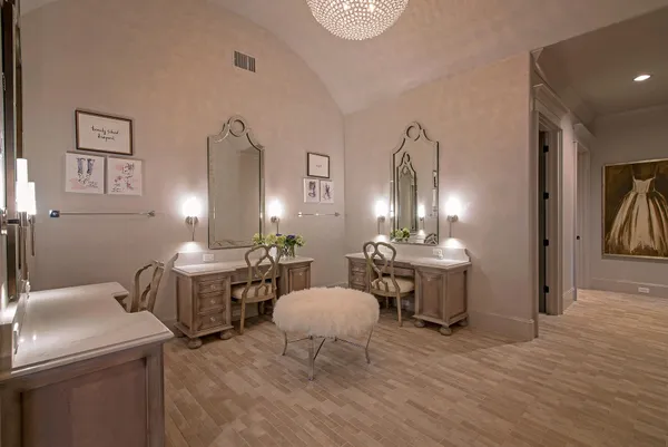 a kitchen with stainless steel appliances granite countertop a refrigerator and a stove