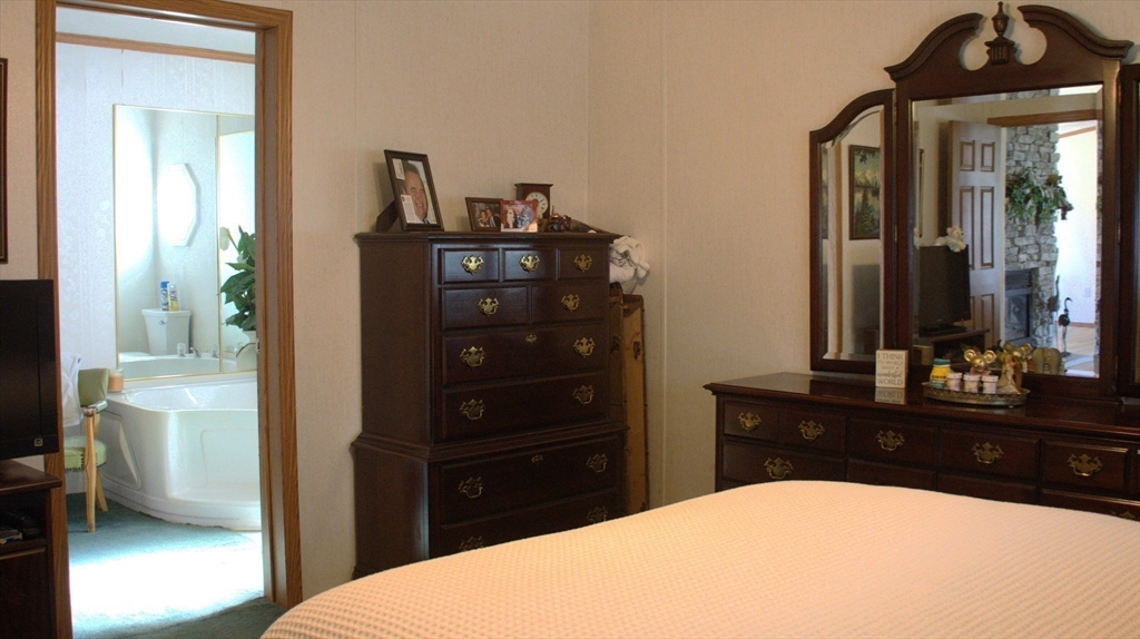 20 Deer Run Brookfield, MA 01506 - Photo 16 of 29 a bathroom with a sink vanity and a mirror