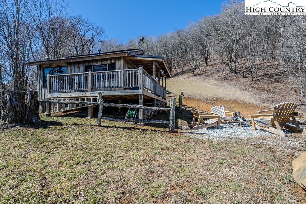 Jerry's Creek Road Newland, NC 28657 - Photo 11 of 49 a view of a house with a yard and sitting area
