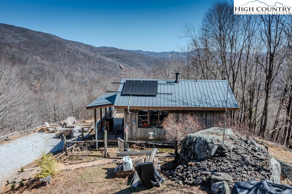 Jerry's Creek Road Newland, NC 28657 - Photo 12 of 49 a front view of house with outdoor seating