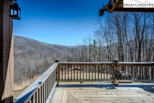 a balcony with wooden floor