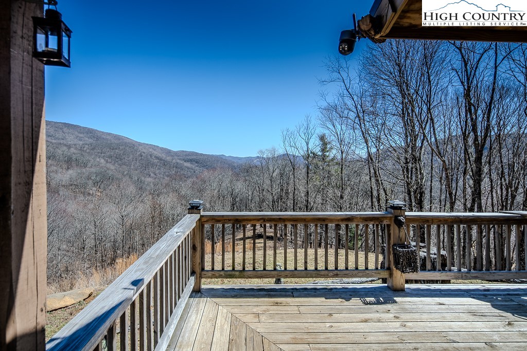 Jerry's Creek Road Newland, NC 28657 - Photo 13 of 49 a balcony with wooden floor
