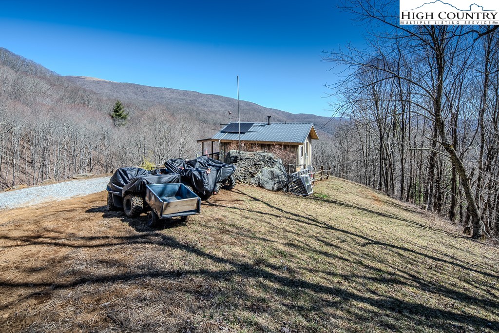 Jerry's Creek Road Newland, NC 28657 - Photo 15 of 49 a view of a backyard with wooden fence