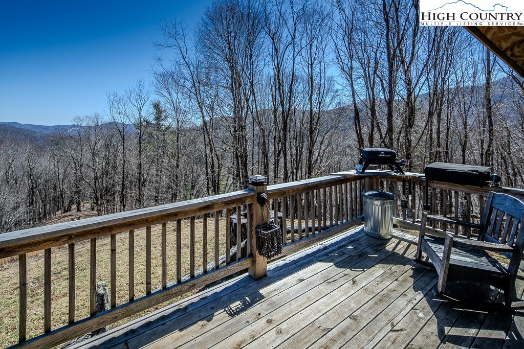 Jerry's Creek Road Newland, NC 28657 - Photo 16 of 49 a view of balcony with wooden floor and fence