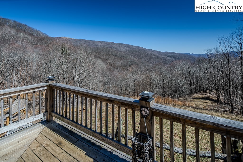 Jerry's Creek Road Newland, NC 28657 - Photo 18 of 49 a view of a balcony with wooden fence