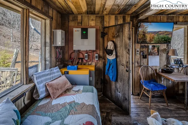 a room with table and chairs